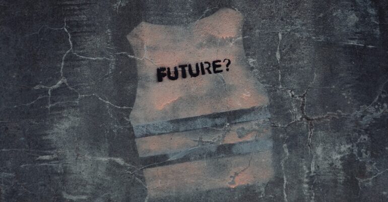 Word "future" written on a cracked, gray, concrete-looking surface, symbolizing the importance of CRM for eCommerce businesses.