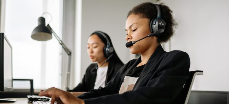 Customer service agents using CRM software.