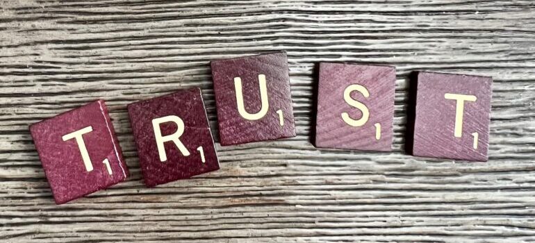 A collection of letters merged to form TRUST.